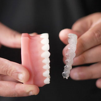 https://faceteethsmile.com/wp-content/uploads/2024/10/proud-to-be-an-Invisalign-provider-M.jpg